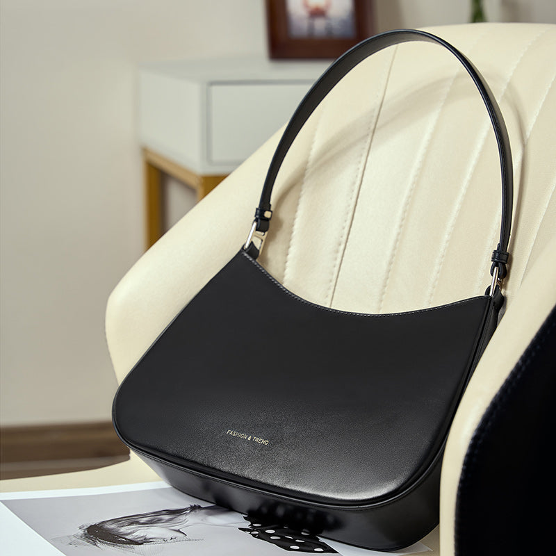 High-end niche design baguette leather shoulder bag