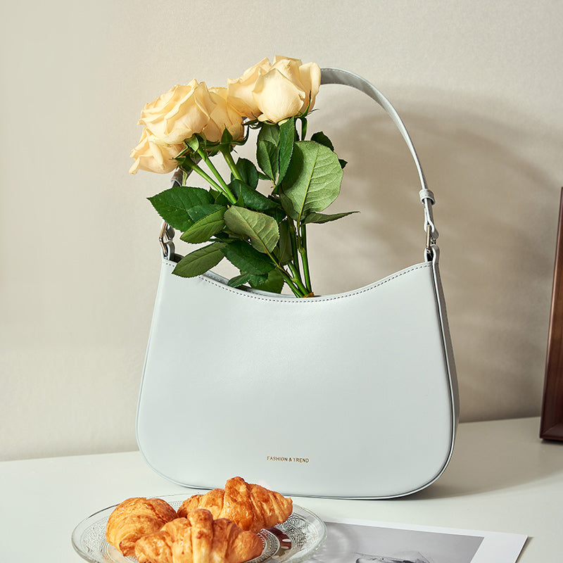 High-end niche design baguette leather shoulder bag