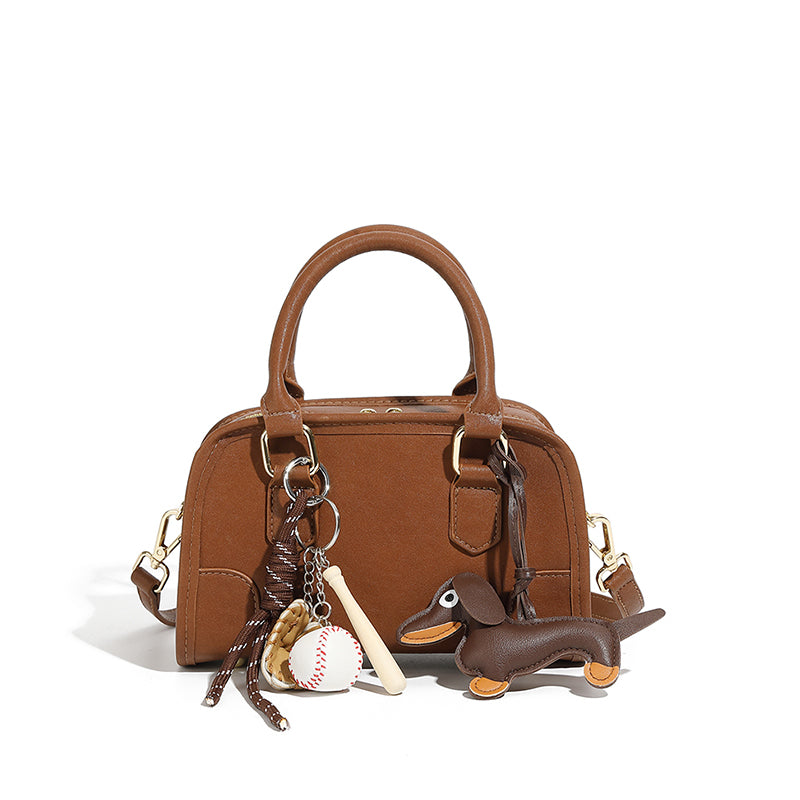 Genuine leather Boston handbag commuter versatile bowling bag niche doll pendant crossbody shoulder bag