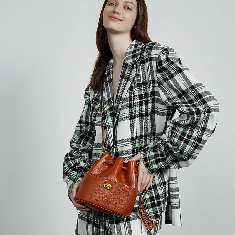 Genuine leather high-grade first-layer cowhide bucket bag tassel niche drawstring shoulder messenger bag