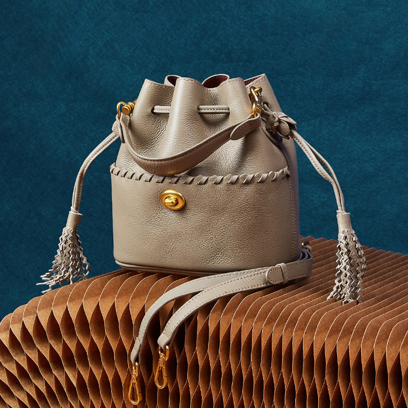 Genuine leather high-grade first-layer cowhide bucket bag tassel niche drawstring shoulder messenger bag