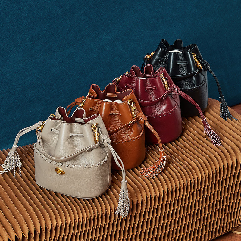 Genuine leather high-grade first-layer cowhide bucket bag tassel niche drawstring shoulder messenger bag