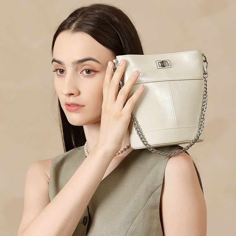 Waxed top layer cowhide fashionable genuine leather bucket bag light luxury women's bag simple mobile phone coin purse