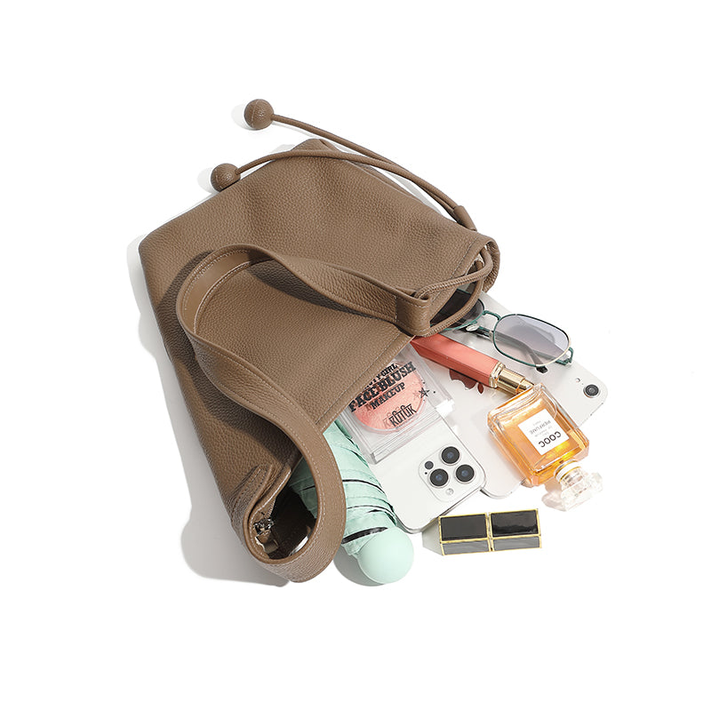 Genuine leather lazy crossbody bag niche asymmetrical design minimalist knotted horn bag shoulder dumpling women's bag