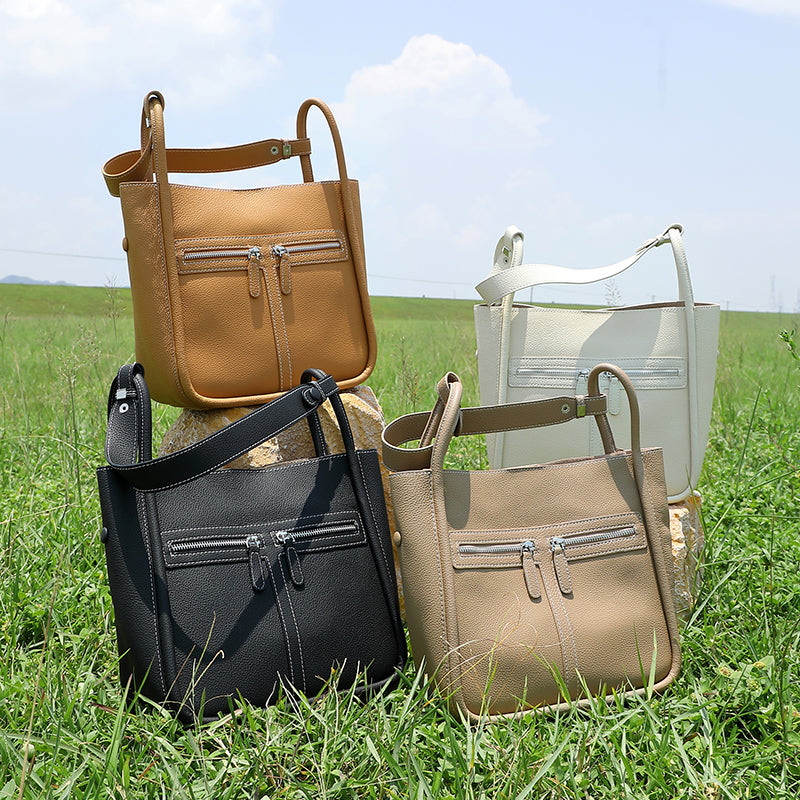 First layer of cowhide genuine leather bucket bag niche light luxury women's bag horseshoe bag large capacity commuter shoulder bag