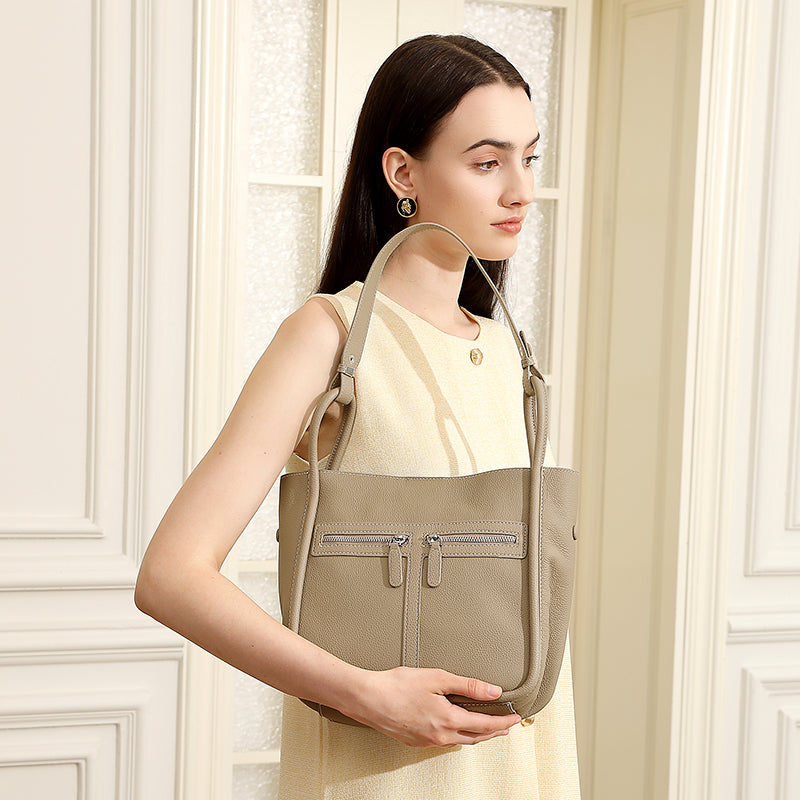 First layer of cowhide genuine leather bucket bag niche light luxury women's bag horseshoe bag large capacity commuter shoulder bag