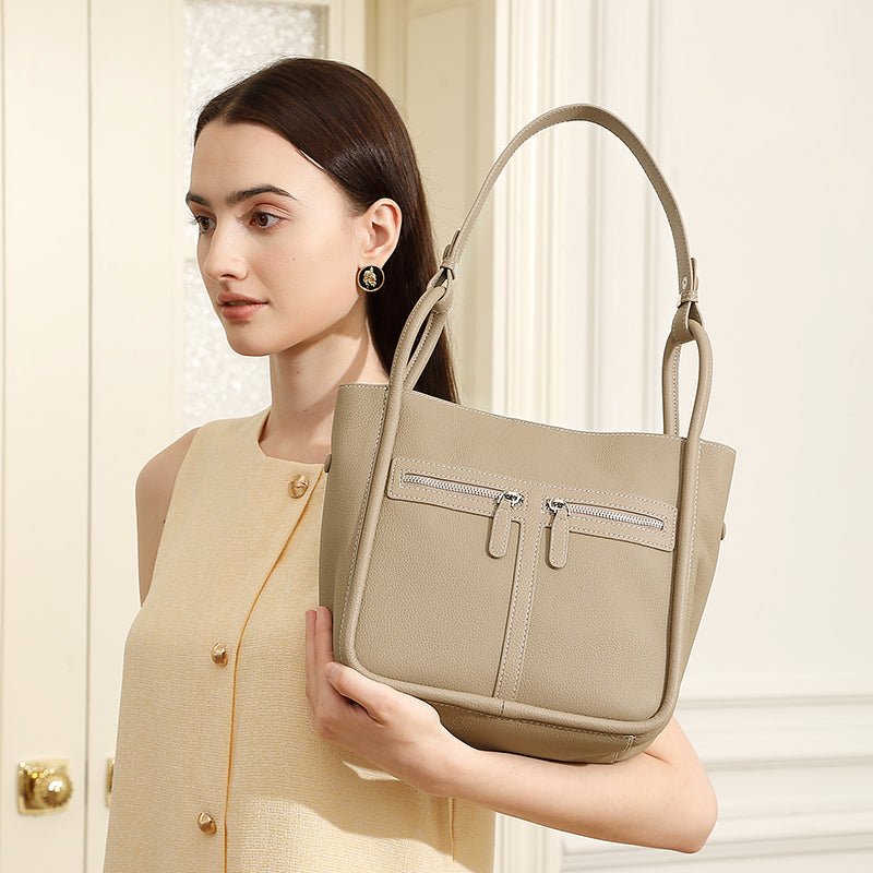 First layer of cowhide genuine leather bucket bag niche light luxury women's bag horseshoe bag large capacity commuter shoulder bag