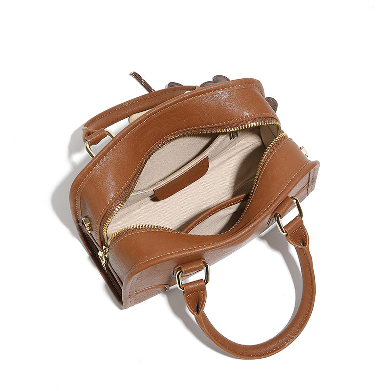 Genuine leather Boston handbag commuter versatile bowling bag niche doll pendant crossbody shoulder bag