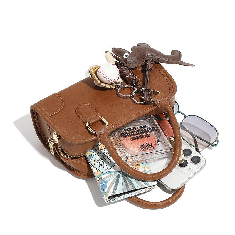 Genuine leather Boston handbag commuter versatile bowling bag niche doll pendant crossbody shoulder bag